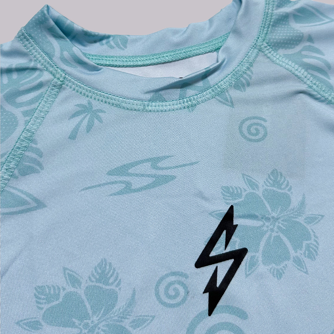 PLAYERA RASHGUARD GIRL CORTE AMPLIO MANGA LARGA XEL I I CELESTE